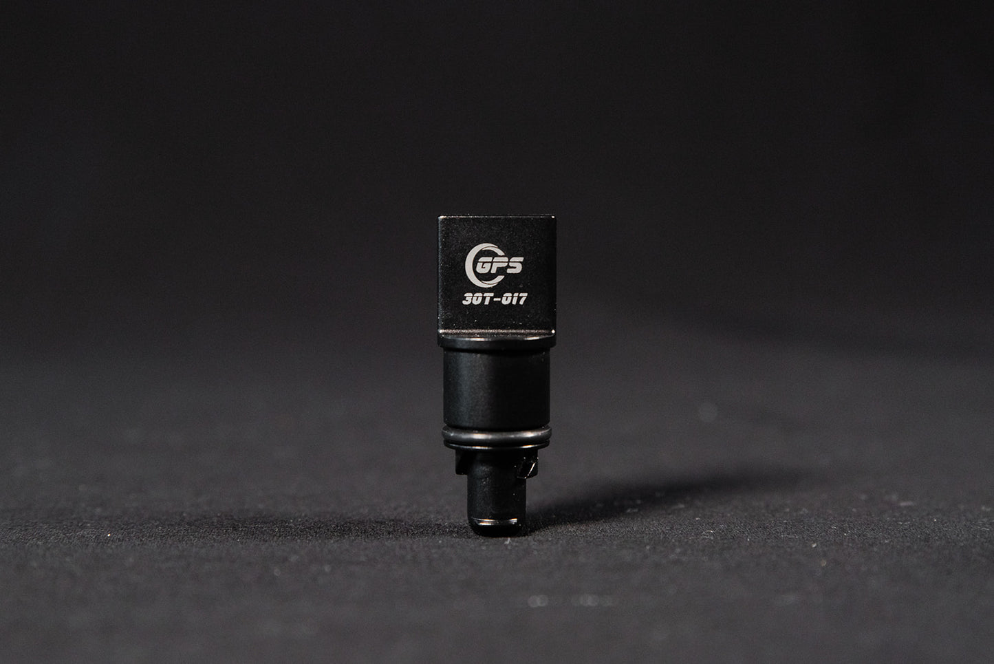 Black anodized CNC-machined 6061 aluminum lower radiator hose drain plug by GPS, featuring etched logo and 3.0T-017 marking – premium upgrade for Audi 3.0T engines.