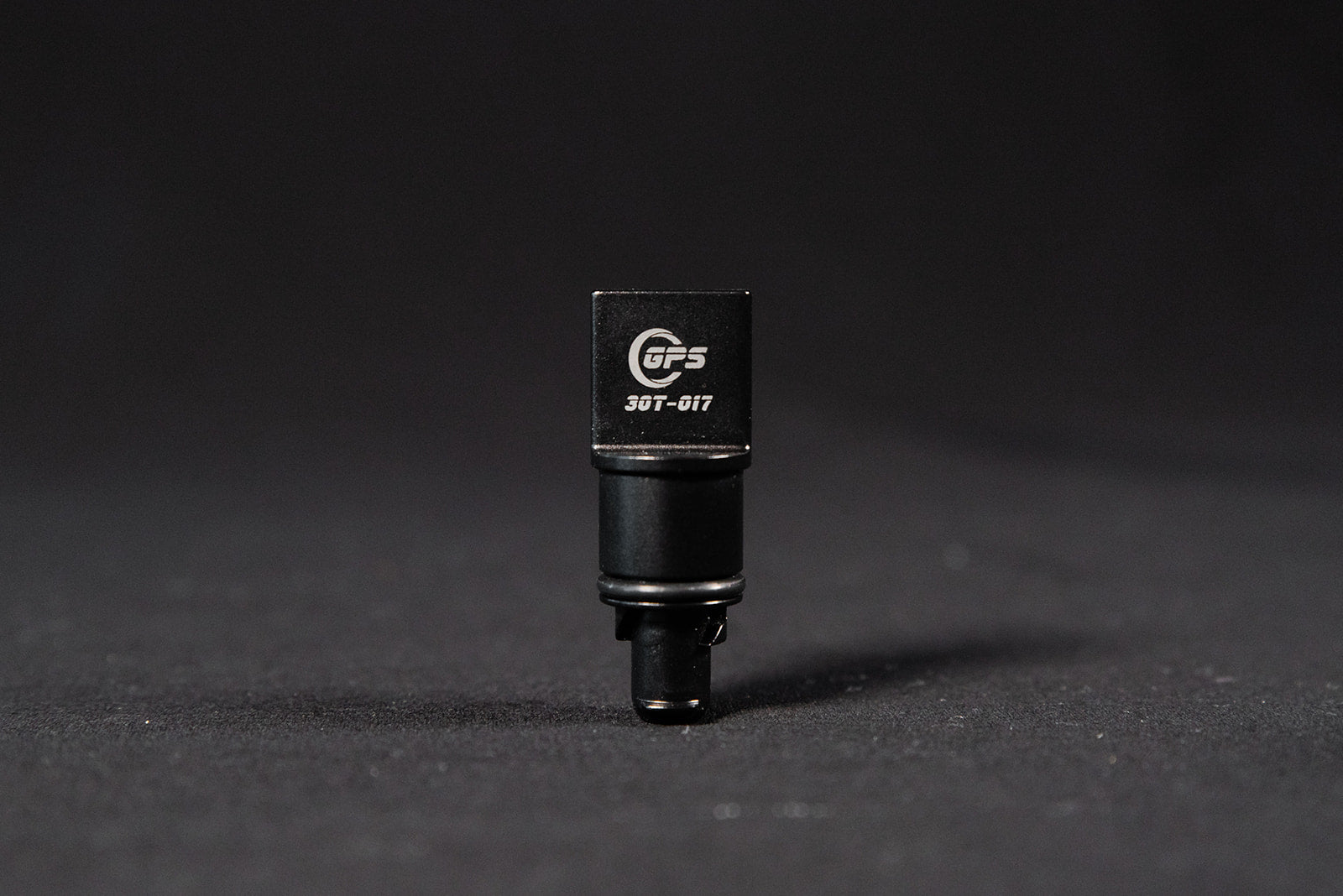 Black anodized CNC-machined 6061 aluminum lower radiator hose drain plug by GPS, featuring etched logo and 3.0T-017 marking – premium upgrade for Audi 3.0T engines.