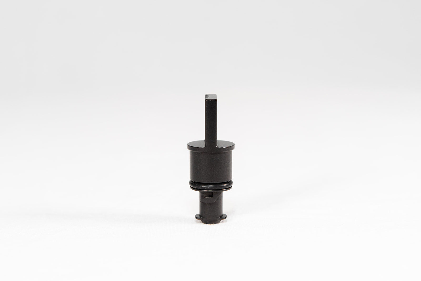 Black anodized CNC-machined 6061 aluminum lower radiator hose drain plug by GPS, featuring etched logo and 3.0T-017 marking – premium upgrade for Audi 3.0T engines.