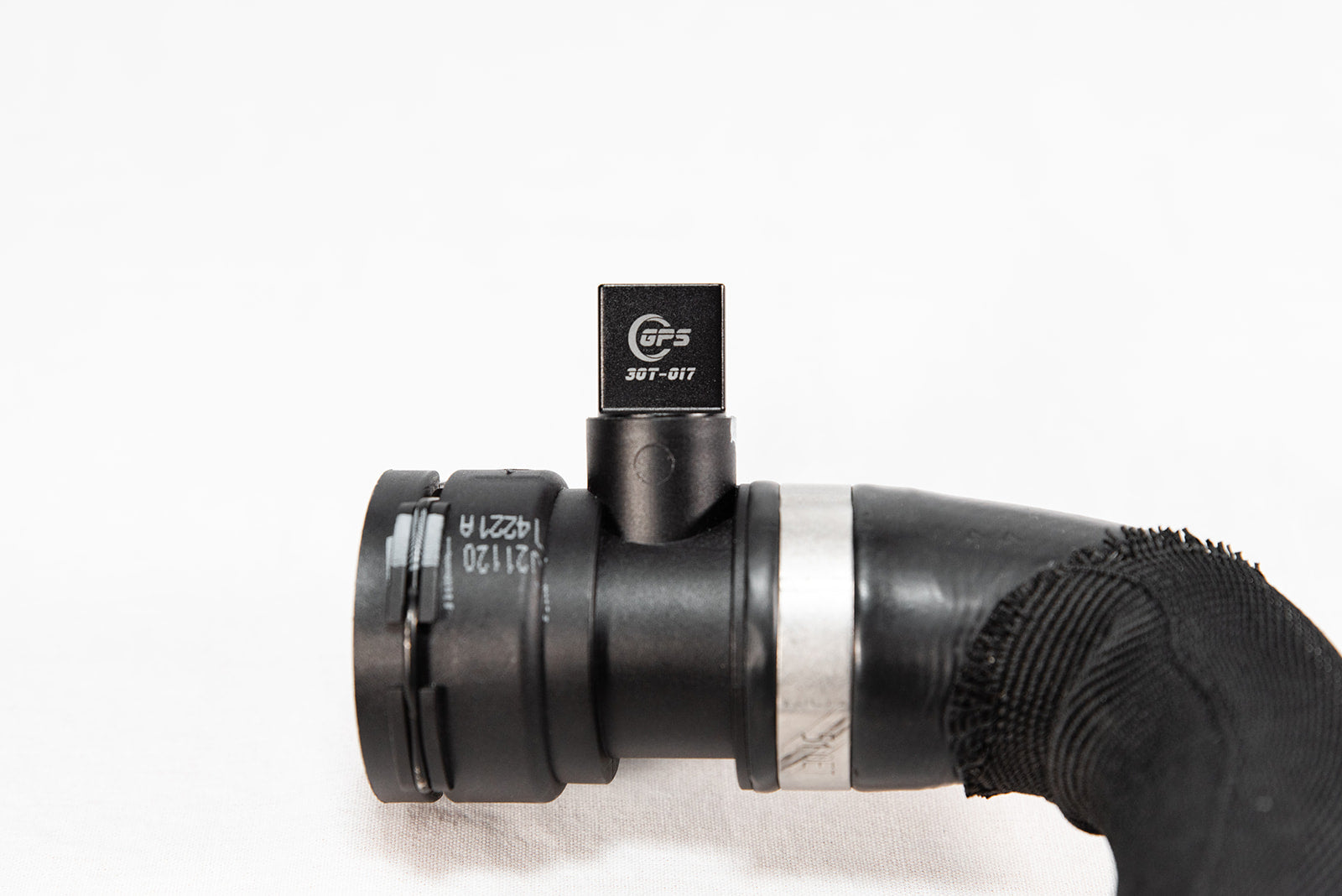 Black anodized CNC-machined 6061 aluminum lower radiator hose drain plug by GPS, featuring etched logo and 3.0T-017 marking – premium upgrade for Audi 3.0T engines.